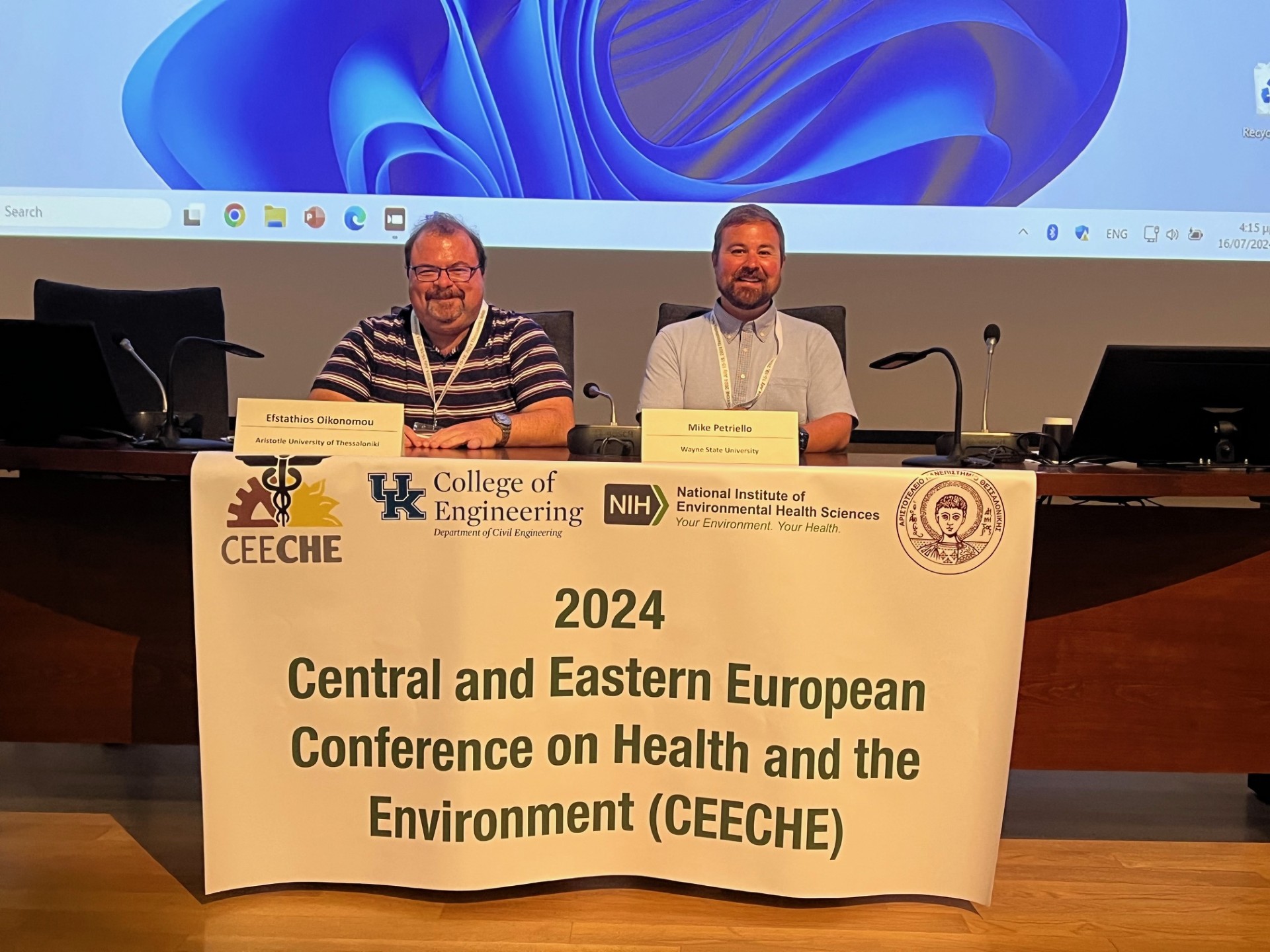 Michael Petriello and trainee Stephanie Morgan present research at CEECHE in Greece