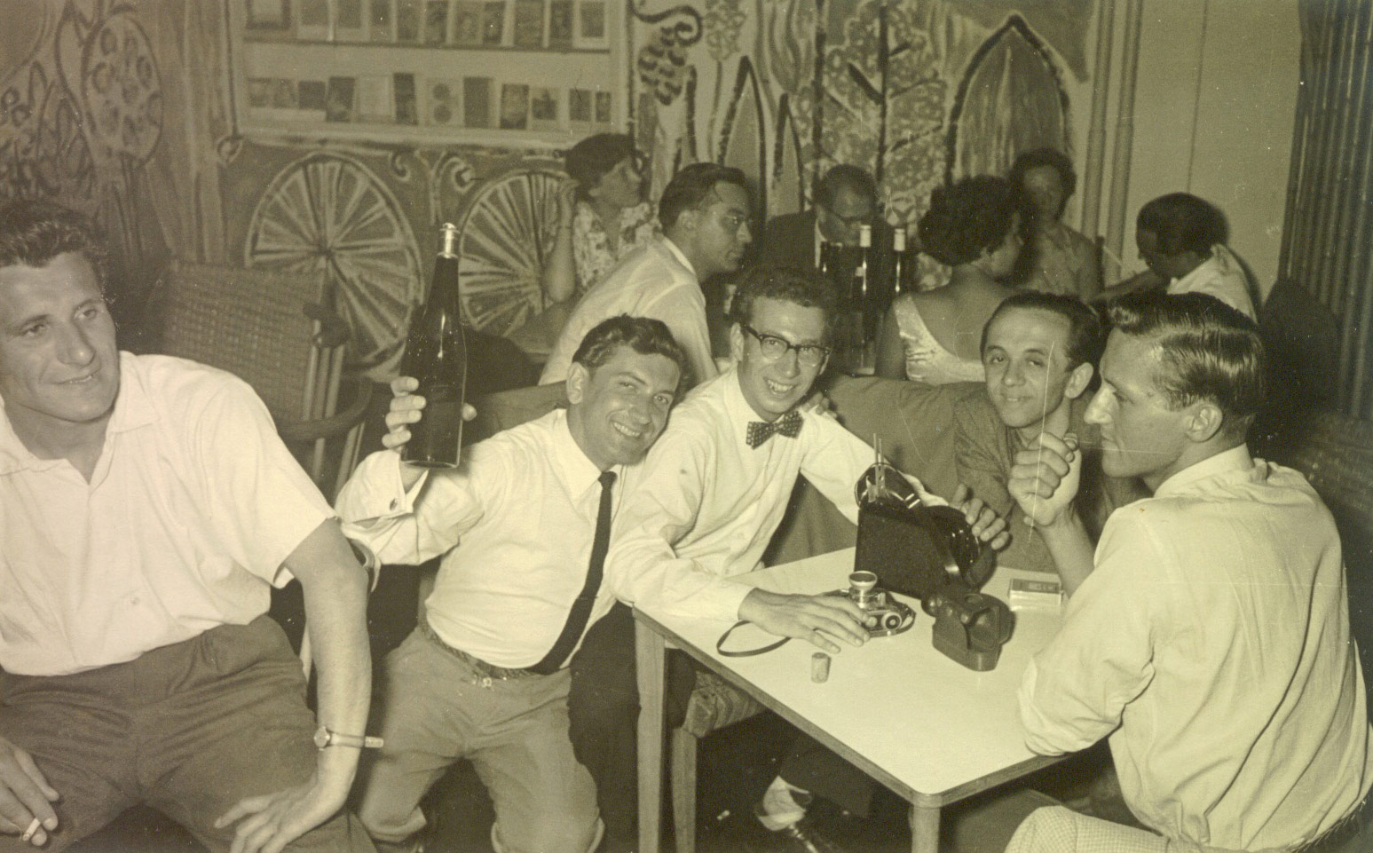 JYM students at a student party held at the Türkenstraße dormitory.  Pictured are JYM students Fred Kauffman, second from left and Ken Kurze, front right, with their German friends