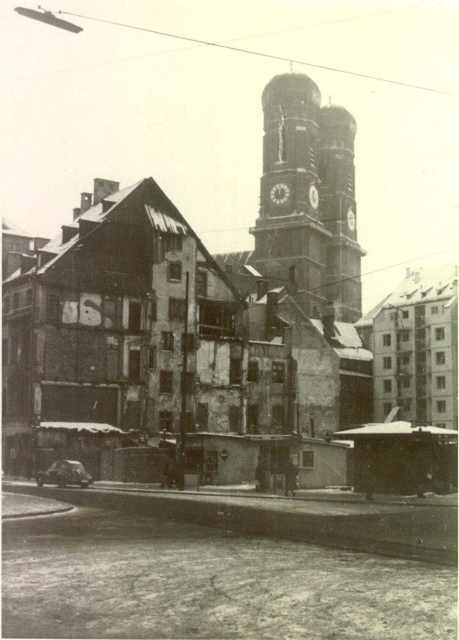 Heavily bombed Munich apartments in the Altstadt in front of the Frauenkirche, 1956. Photo by Ken Kurze